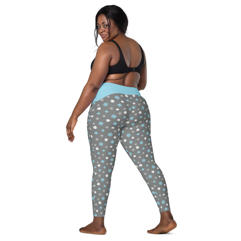 back view of dark-skinned female-presenting plus size model looking over her shoulder. She is wearing the demiboy dice leggings and a black sports bra