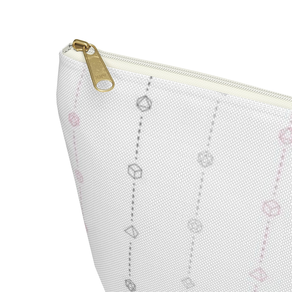 the large demigirl dice t-bottom pouch corner detail on a white background. it's white with light grey, dark grey, and pink stripes of dashed lines and polyhedral dice and a gold zipper pull