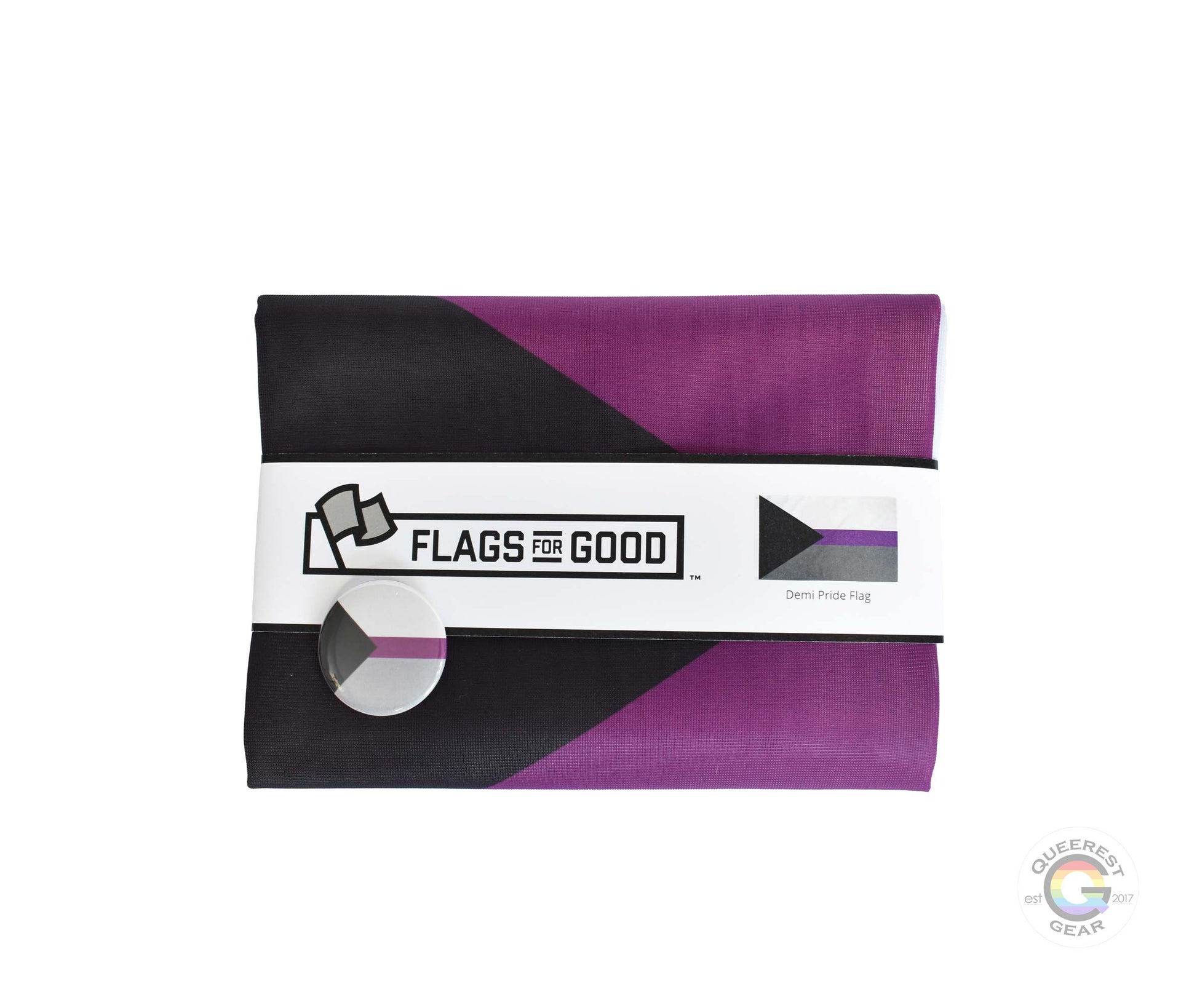  The demisexual pride flag folded in its packaging with the matching free demisexual flag button