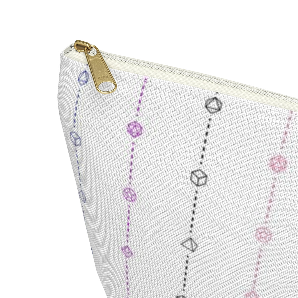 the large genderfluid dice t-bottom pouch corner detail on a white background. it's white with magenta, peach, black, and blue stripes of dashed lines and polyhedral dice and a gold zipper pull