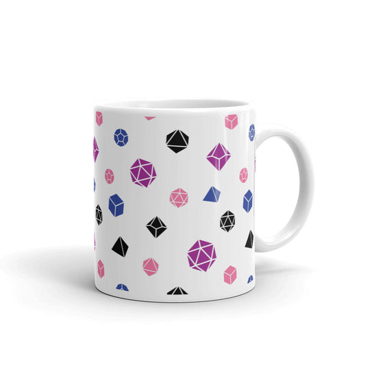 white mug on a white background with handle facing right. It has an all-over print of polyhedral d&d dice in the genderfluid colors of peach, magenta, black, and blue