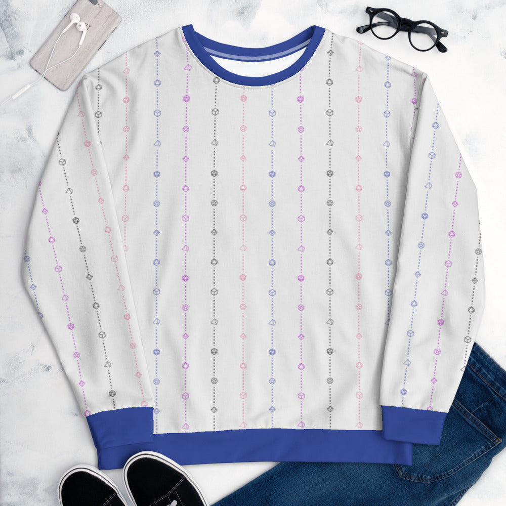 The genderfluid pride sweater laying flat, surrounded by clothes, a phone, and glasses. the sweater is white and has stripes of dashed lines and polyhedral dnd dice in blue, black, peach, and magenta. The cuffs, collar, and waistband are a matching blue