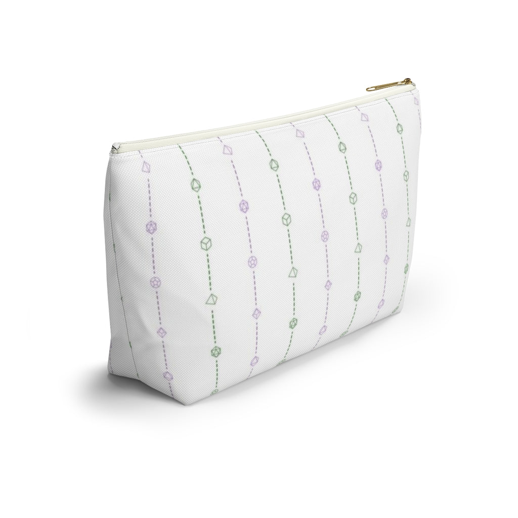 the large genderqueer dice t-bottom pouch in side view on a white background. it's white with green and purple stripes of dashed lines and polyhedral dice and a gold zipper pull