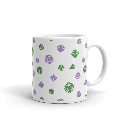 white mug on a white background with handle facing right. It has an all-over print of polyhedral d&d dice in the genderqueer colors of green and purple