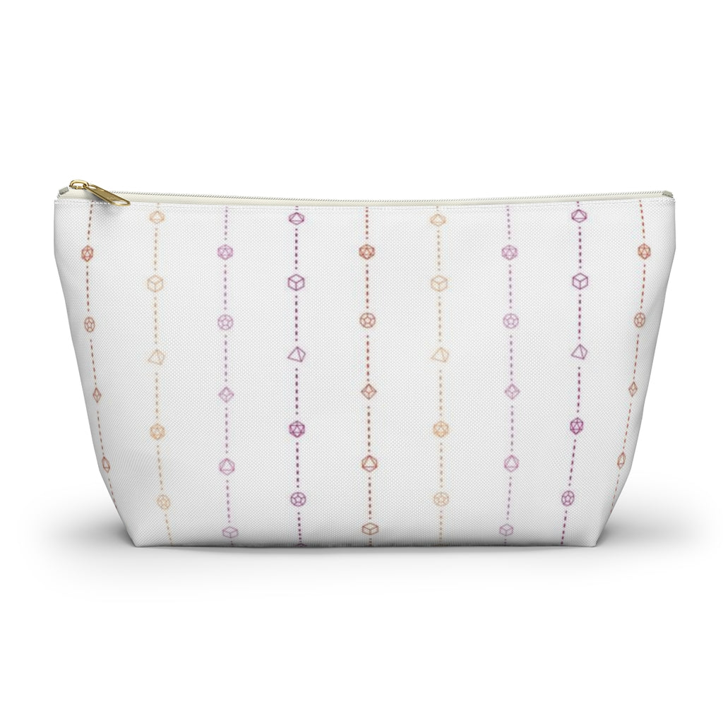 the large lesbian dice t-bottom pouch in front view on a white background. it's white with pink and orange stripes of dashed lines and polyhedral dice and a gold zipper pull