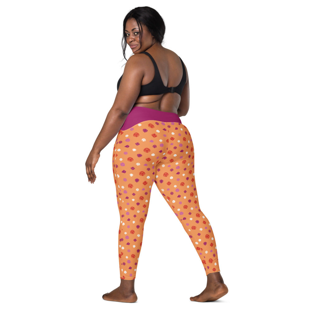 back view of dark-skinned female-presenting plus size model looking over her shoulder. She is wearing the lesbian dice leggings and a black sports bra