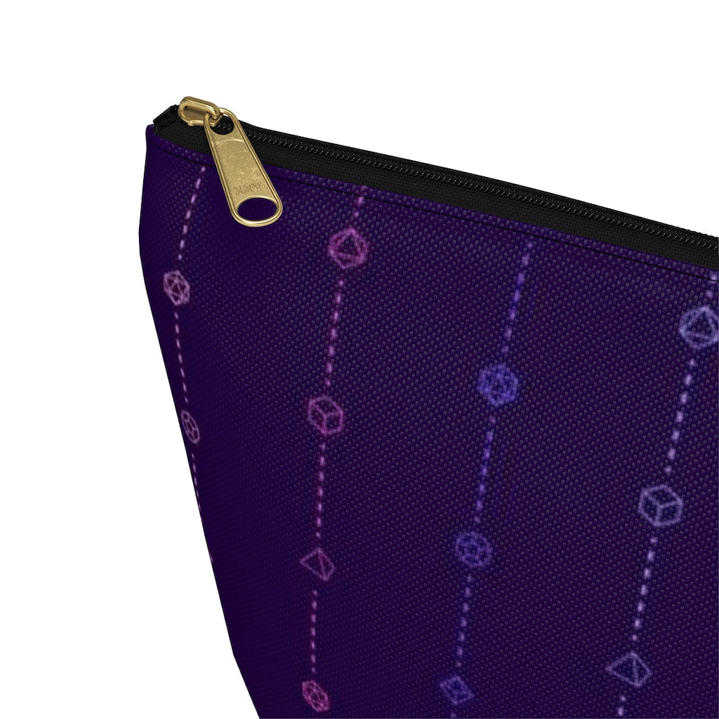 the large omnisexual dice t-bottom pouch corner detail on a white background. it's dark purple with pink and blue stripes of dashed lines and polyhedral dice and a gold zipper pull