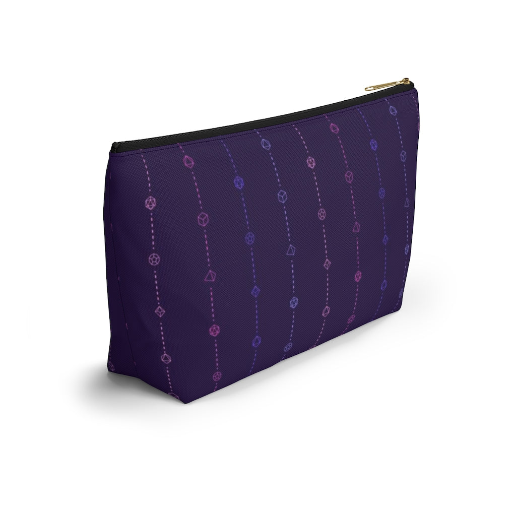 the large omnisexual dice t-bottom pouch in side view on a white background. it's dark purple with pink and blue stripes of dashed lines and polyhedral dice and a gold zipper pull