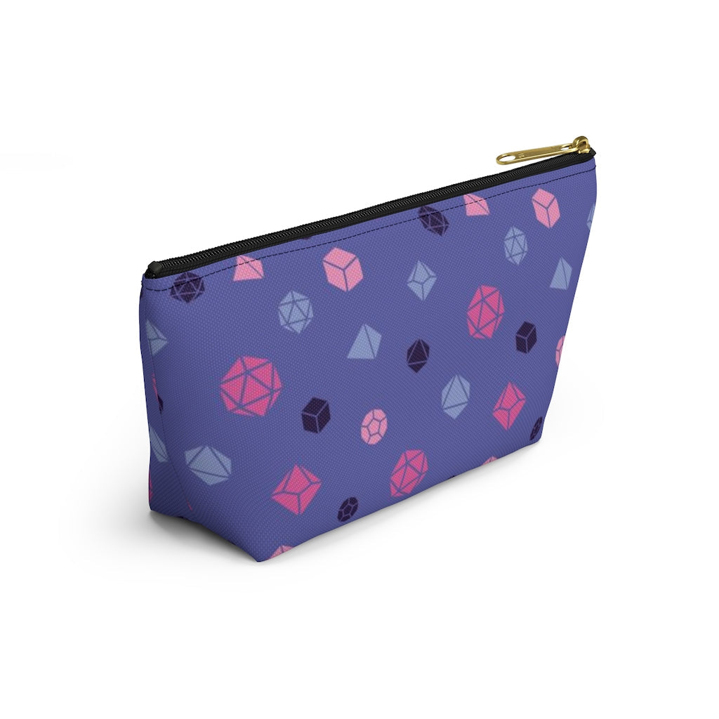 the small omnisexual dice t-bottom pouch in side view on a white background. it's blue with pink, blue, and dark purple polyhedral dice and a gold zipper pull