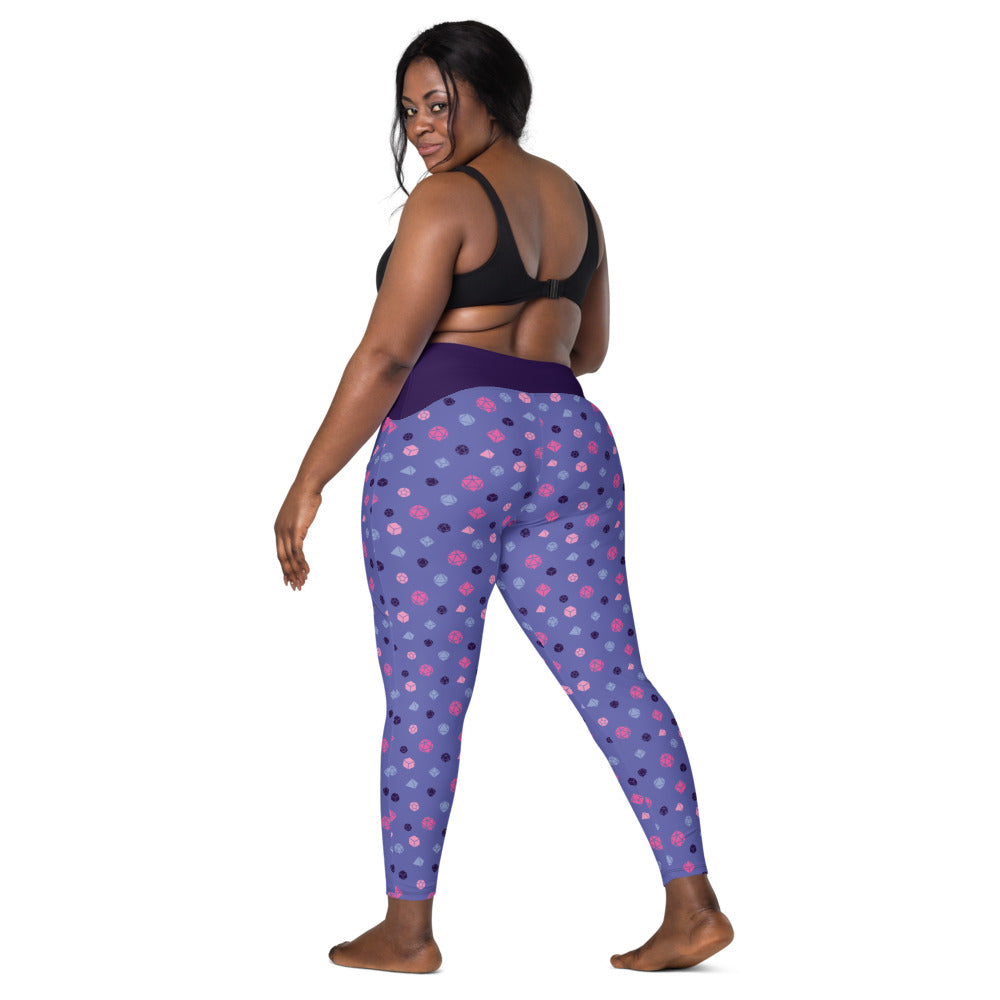 back view of dark-skinned female-presenting plus size model looking over her shoulder. She is wearing the omnisexual dice leggings and a black sports bra