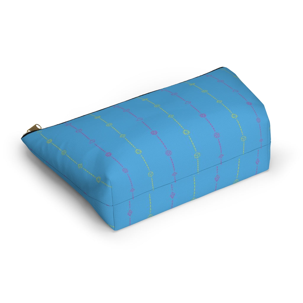 the large pansexual dice t-bottom pouch in bottom view on a white background. it's blue with pink and yellow stripes of dashed lines and polyhedral dice and a gold zipper pull
