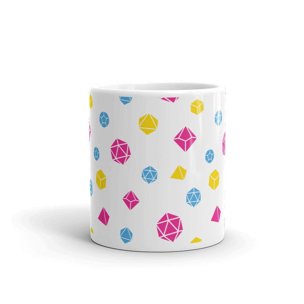 white mug on a white background with handle facing back. It has an all-over print of polyhedral d&d dice in the pansexual colors of pink, blue, and yellow