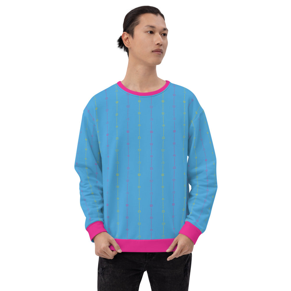 light-skinned dark haired model on a white background facing right wearing the pansexual pride dice sweater