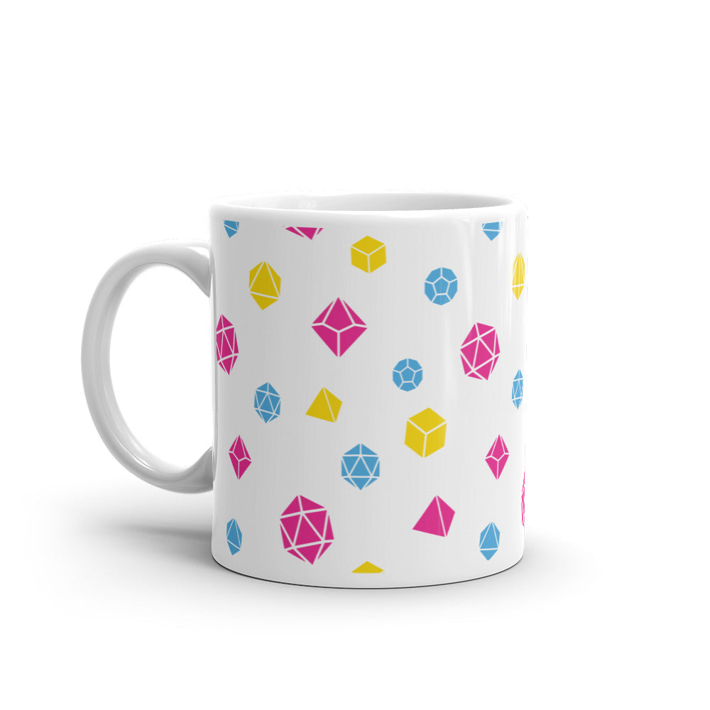 white mug on a white background with handle facing left. It has an all-over print of polyhedral d&d dice in the pansexual colors pf pink, blue, and yellow