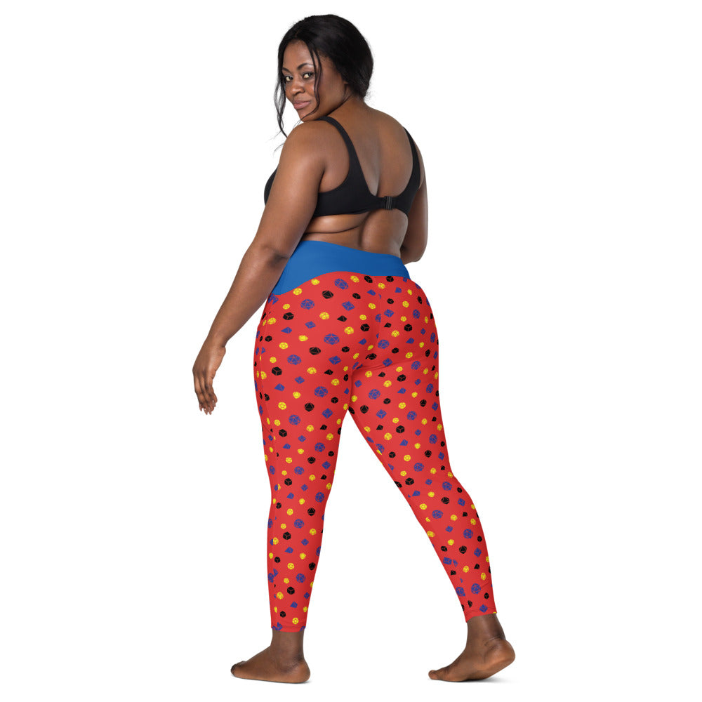 back view of dark-skinned female-presenting model looking over her shoulder. She is wearing the polyamory dice leggings and a black sports bra