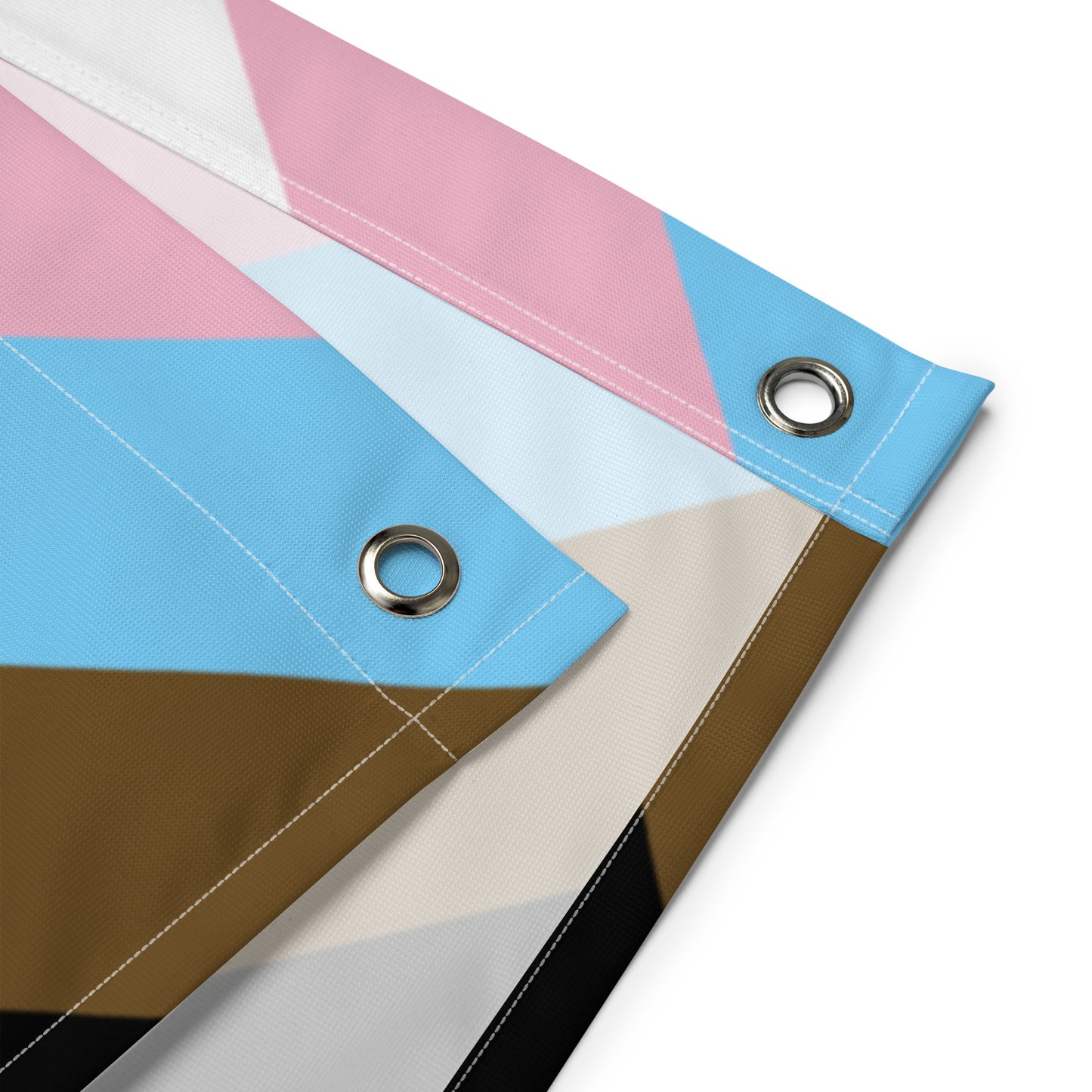 a close-up of the grommets at the corners of the progress pride blackbeard pirate flag