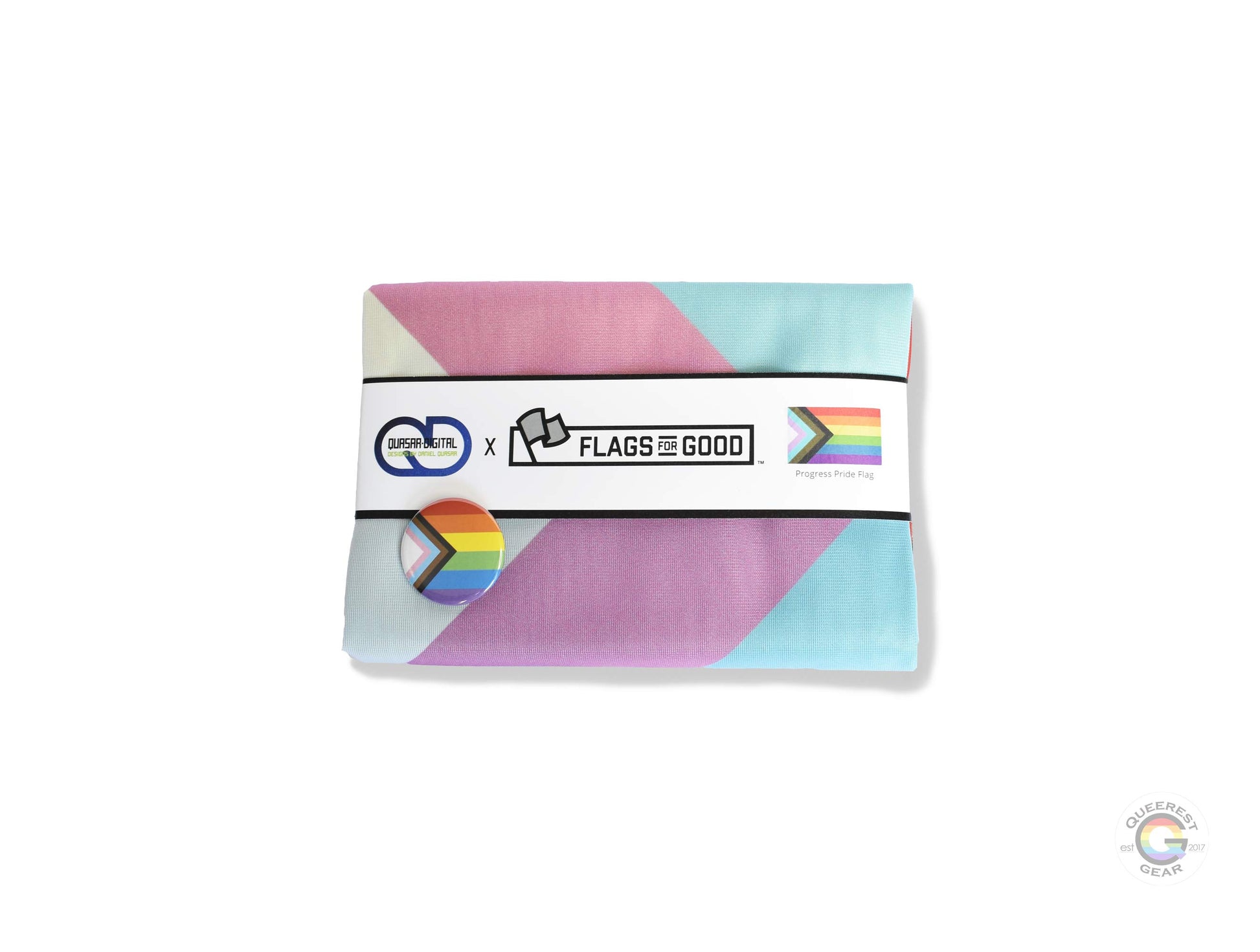 The progress pride flag folded in its packaging with the matching free progress flag button