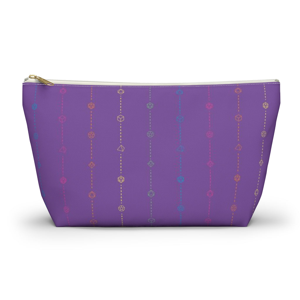 the large rainbow dice t-bottom pouch in front view on a white background. it's purple with pink, orange, yellow, green, and blue stripes of dashed lines and polyhedral dice and a gold zipper pull