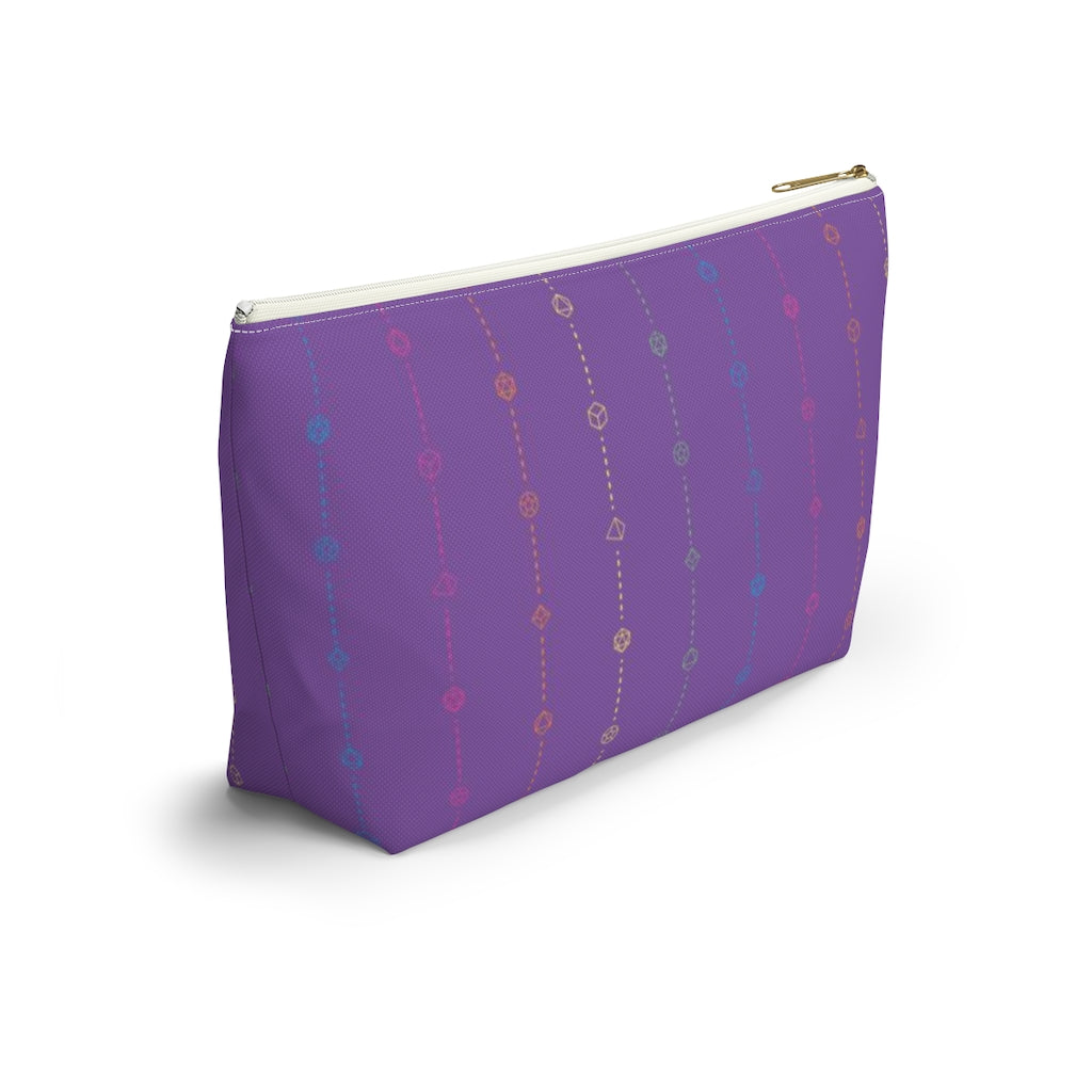 the large rainbow dice t-bottom pouch in side view on a white background. it's purple with pink, orange, yellow, green, and blue stripes of dashed lines and polyhedral dice and a gold zipper pull