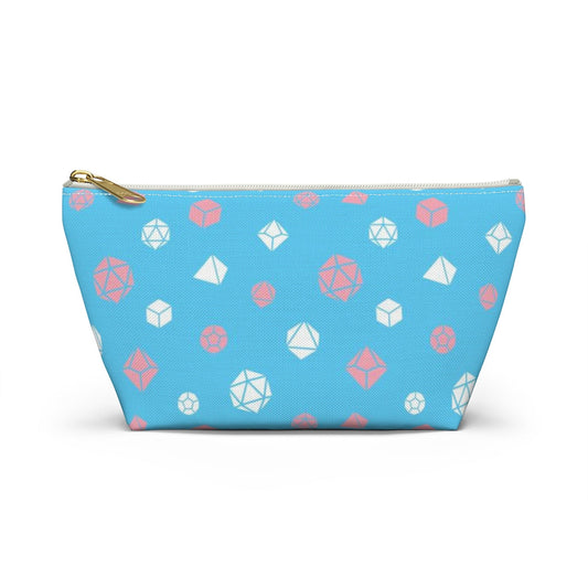 the small trans dice t-bottom pouch in front view on a white background. it's blue with pink and white polyhedral dice and a gold zipper pull